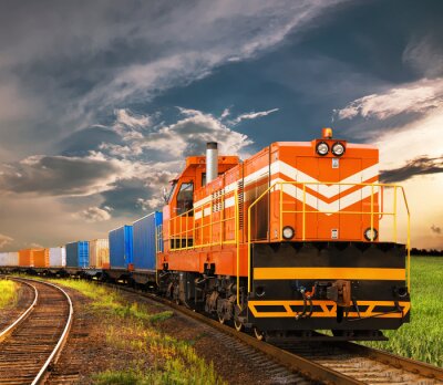 Fototapete Bunter Güterzug mit Himmelhintergrund