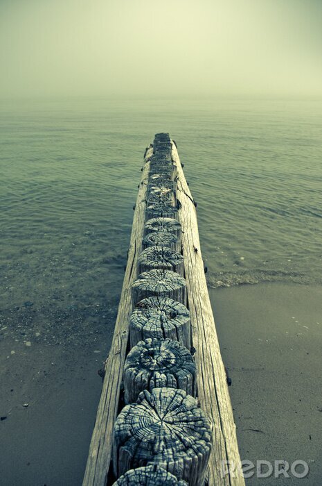 Fototapete Das Meer und die Wellenbrecher