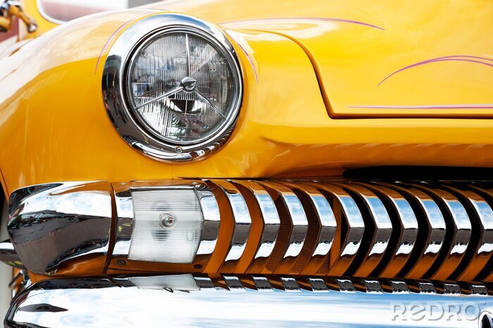 Fototapete Detail des gelben Autos