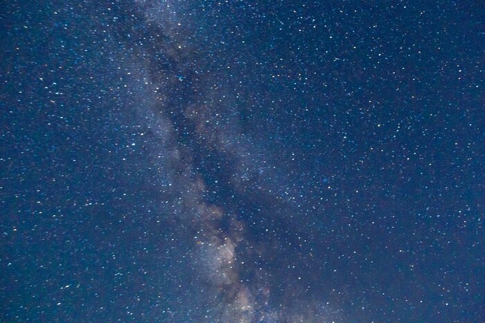 Fototapete Die Milchstraße, die den Himmel überquert