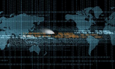 Fototapete Digitale Daten vor dem Hintergrund der Weltkarte