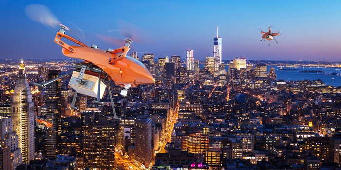 Fototapete Drohnen über einer Stadt in Amerika