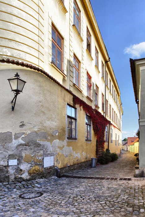 Fototapete Ecke der gepflasterten Straße