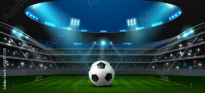 Fototapete Ein Ball auf dem Spielfeld eines nächtlichen Stadions