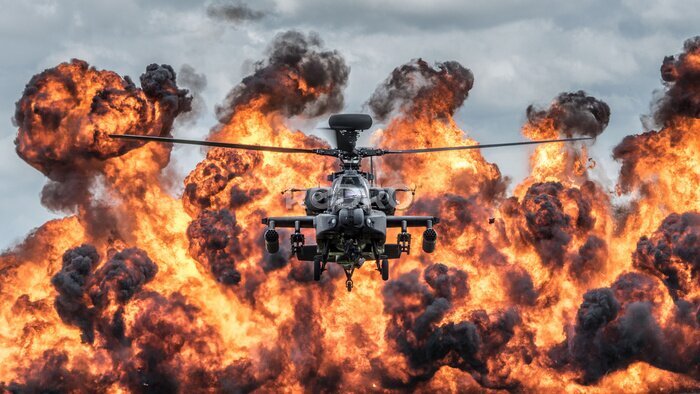Fototapete Ein Helikopter brennt