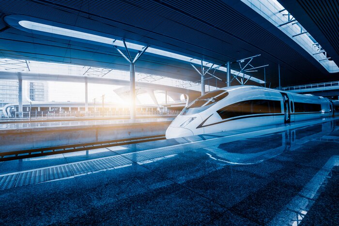 Fototapete Ein moderner Hochgeschwindigkeitszug auf einem Bahnsteig
