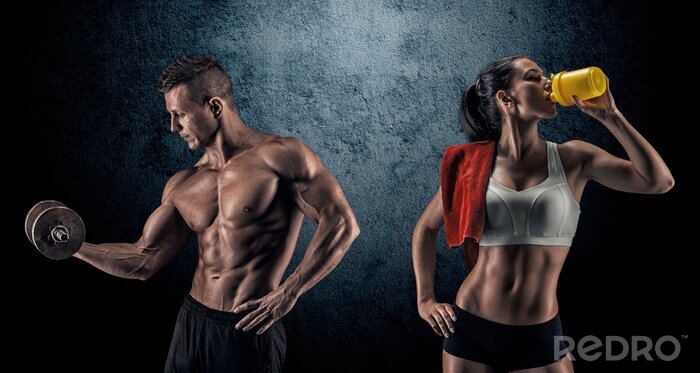 Fototapete Ein Paar beim Training im Fitnessstudio
