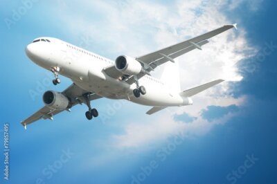 Fototapete Ein Passagierflugzeug am Himmel