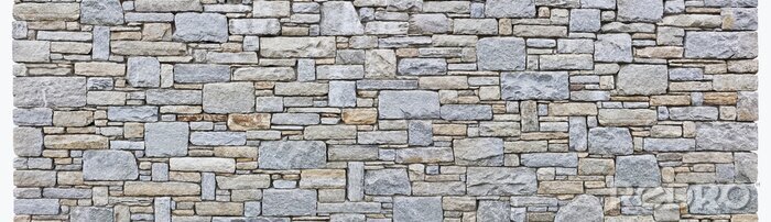 Fototapete Eine Steinmauer unterschiedlicher Größe