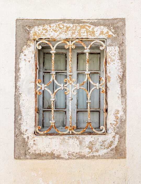 Fototapete Fenster hinter alten gittern