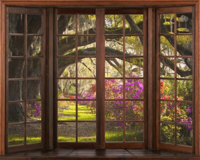 Fenster mit Blick auf einen märchenhaften Garten