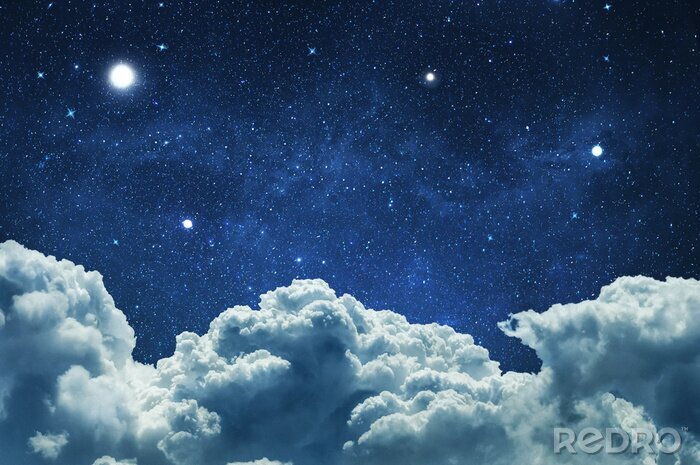 Fototapete Flauschige Wolken am Sternenhimmel bei Nacht