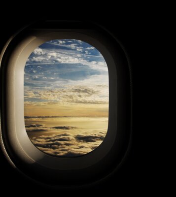 Flugzeugfenster und Wolken