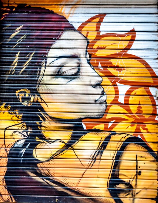 Fototapete Frau mit Blumen auf Graffiti