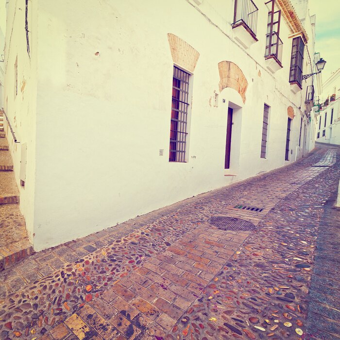 Fototapete Gasse bei altem Gebäude