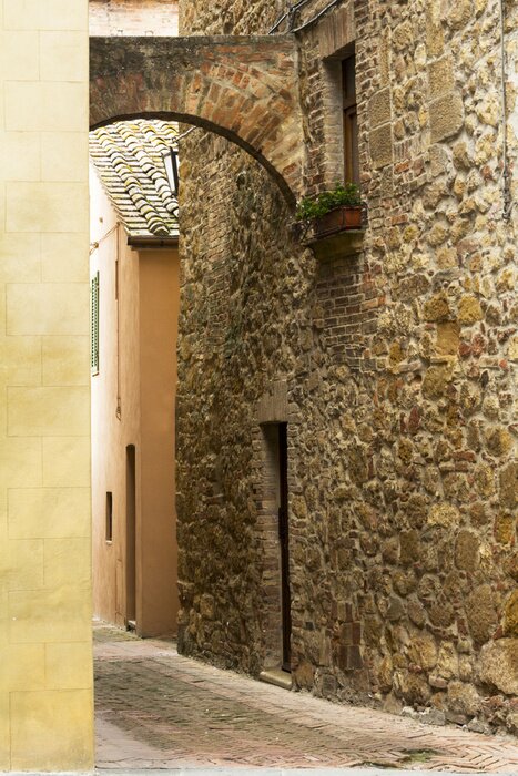 Fototapete Gasse bei Steinhäusern