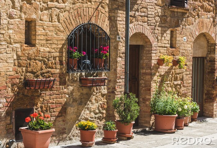 Fototapete Gasse Italien mit schönen Blumen
