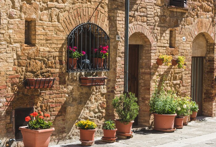 Fototapete Gasse Italien mit schönen Blumen