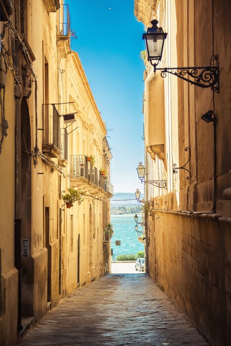 Fototapete Gasse mit Aussicht auf Meer
