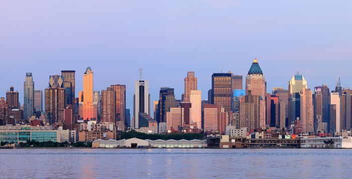 Fototapete Gebäude von New York City bei Sonnenuntergang