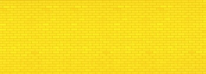 Fototapete Gelbe Backsteinmauer
