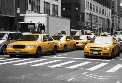 Fototapete Gelbe Taxis auf monochromatischem Hintergrund