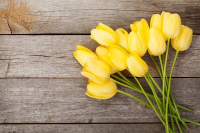Fototapete Gelbe Tulpen auf Brettern