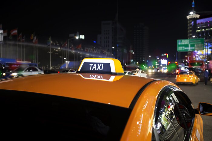 Fototapete Gelbes Taxi in der Nacht