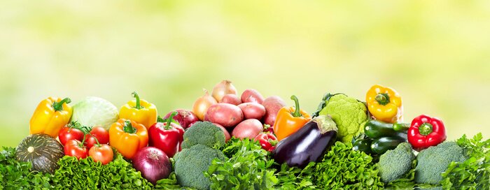 Fototapete Gemüse auf grünem Hintergrund