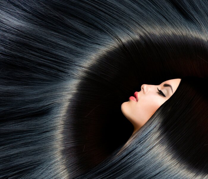 Fototapete Gesicht einer brünetten Frau mit glänzendem Haar