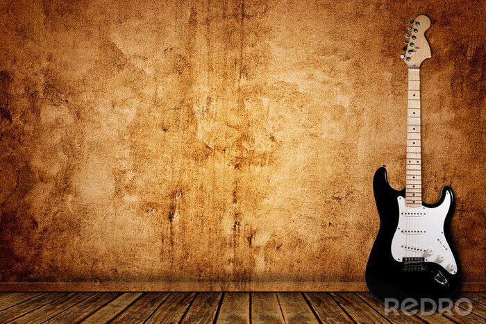 Fototapete Gitarre vor dem Hintergrund der alten Wand
