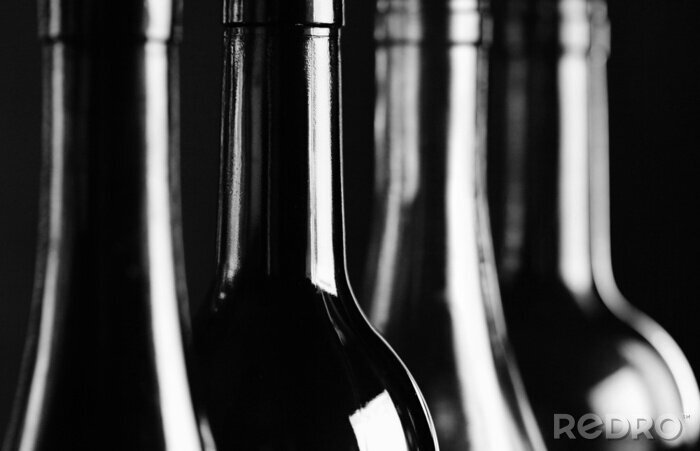 Fototapete Glänzende Weinflaschen