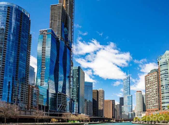 Fototapete Gläserner Wolkenkratzer am blauen Himmel