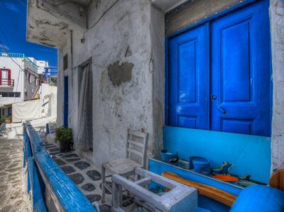 Fototapete Graues Haus mit blauer Tür