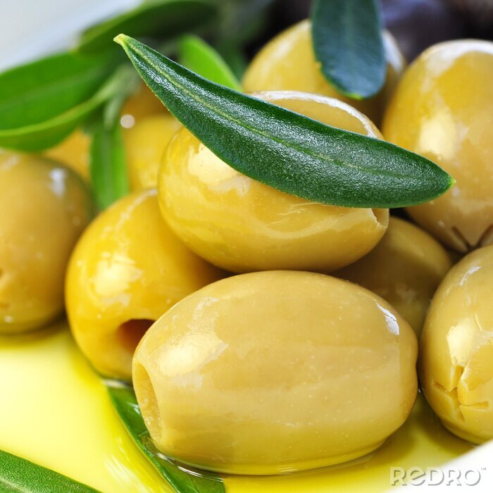 Fototapete Grüne Oliven auf Teller