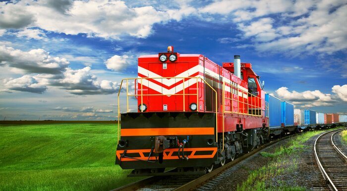 Fototapete Güterzug auf einer Wiese