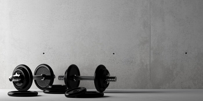 Fototapete Hanteln am Betonhintergrund