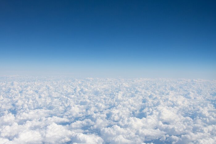 Fototapete Haufenwolken aus der Vogelperspektive