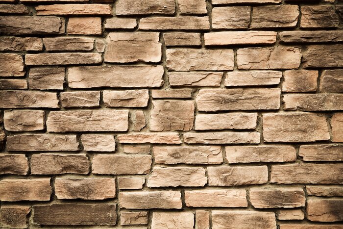 Fototapete Hellbeige Steinmauer