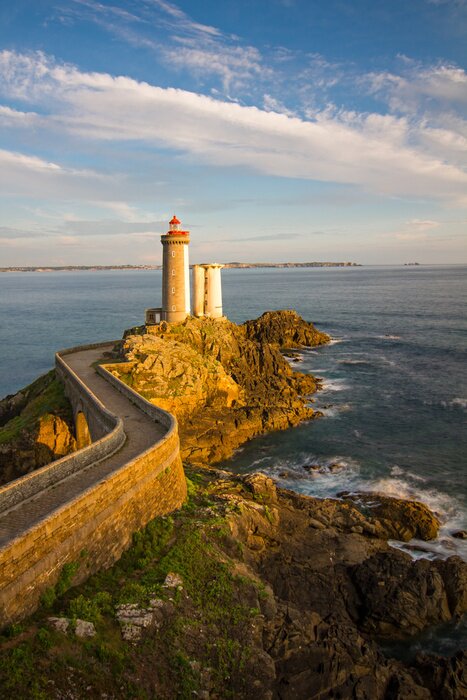 Fototapete Hoher Leuchtturm in Bucht