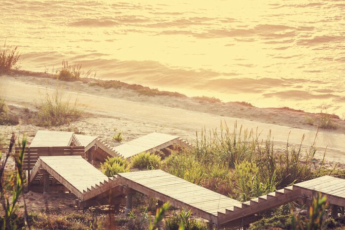 Fototapete Holzstufen am Strand