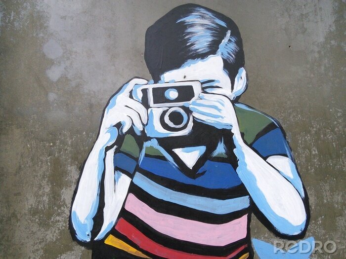 Fototapete Junge mit Kamera auf Graffiti