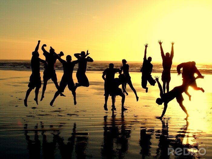 Fototapete Junge Sportler am Strand