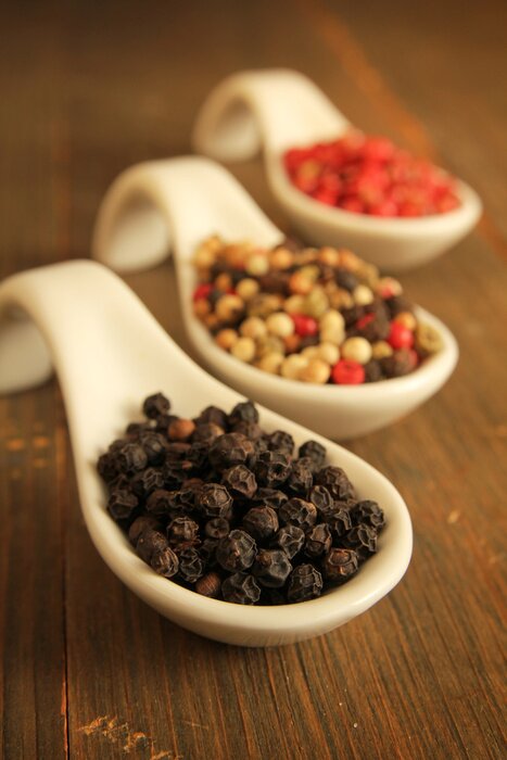 Fototapete Körniger Pfeffer in verschiedenen Farben