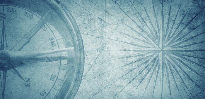 Fototapete Kompass auf dem Hintergrund einer alten Karte