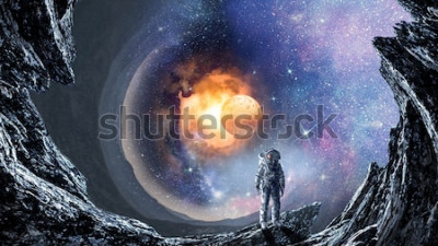 Fototapete Kosmonaut beobachtet Weltraum