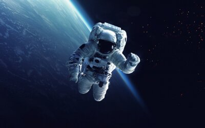 Fototapete Kosmonaut mit der Erde im Hintergrund