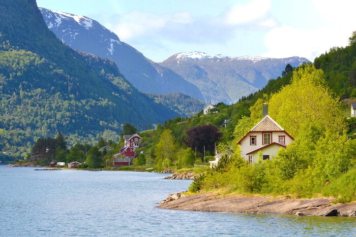 Fototapete Landschaft mit Berghütten
