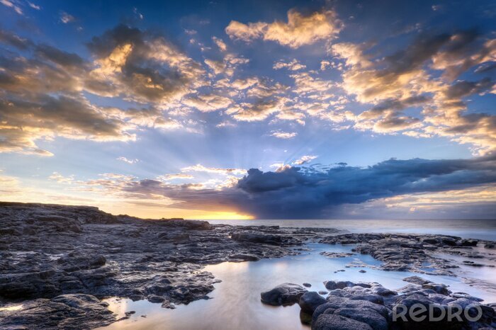 Fototapete Landschaft mit einer felsigen Küste