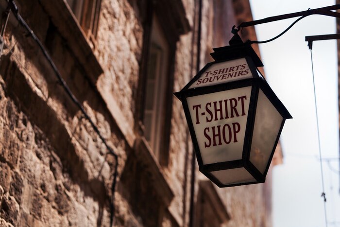 Fototapete Laterne mit Werbung